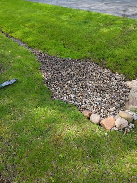 Dry creek bed drainage feature