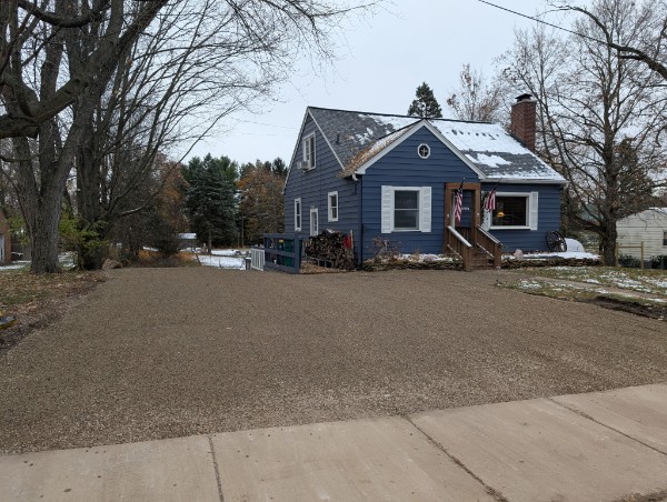 Gravel parking area at residential property